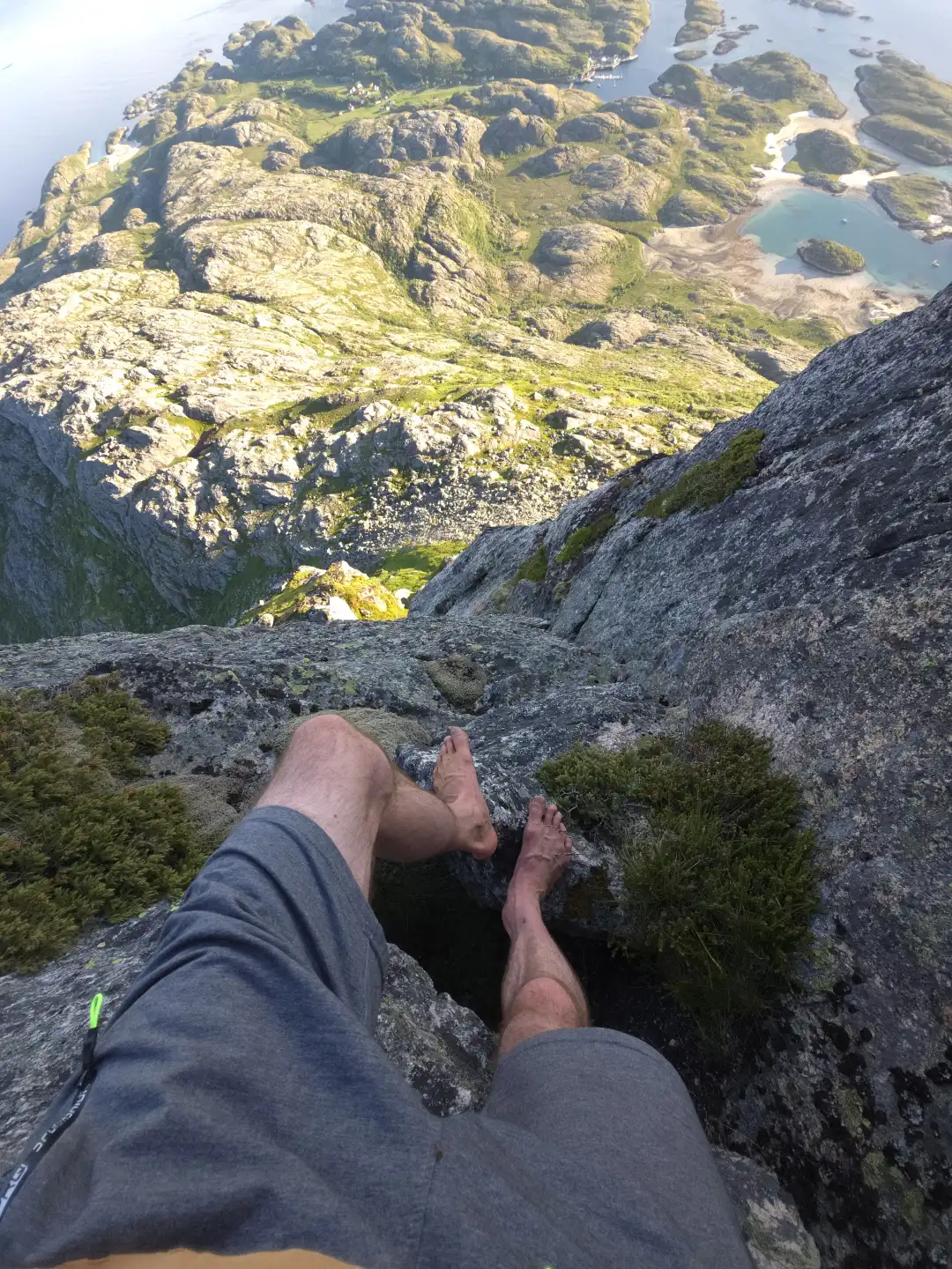 Rock climbing high above the Arctic fjords