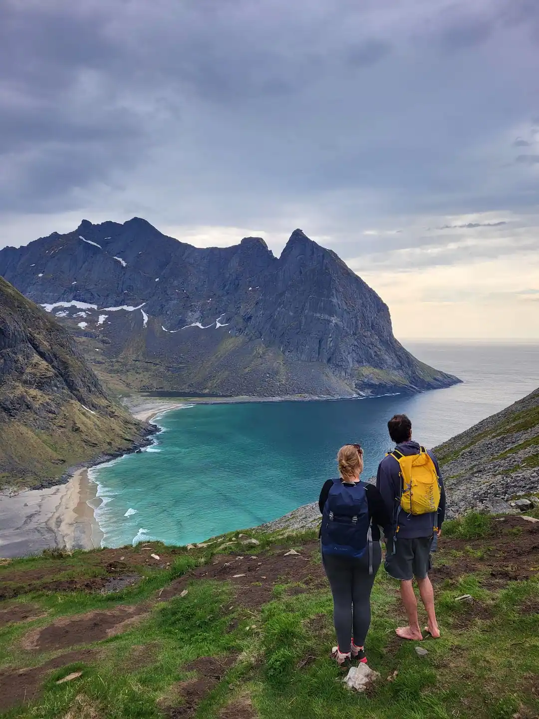 Alex and his girlfriend on Mount Ryten above Kvalvika Beach